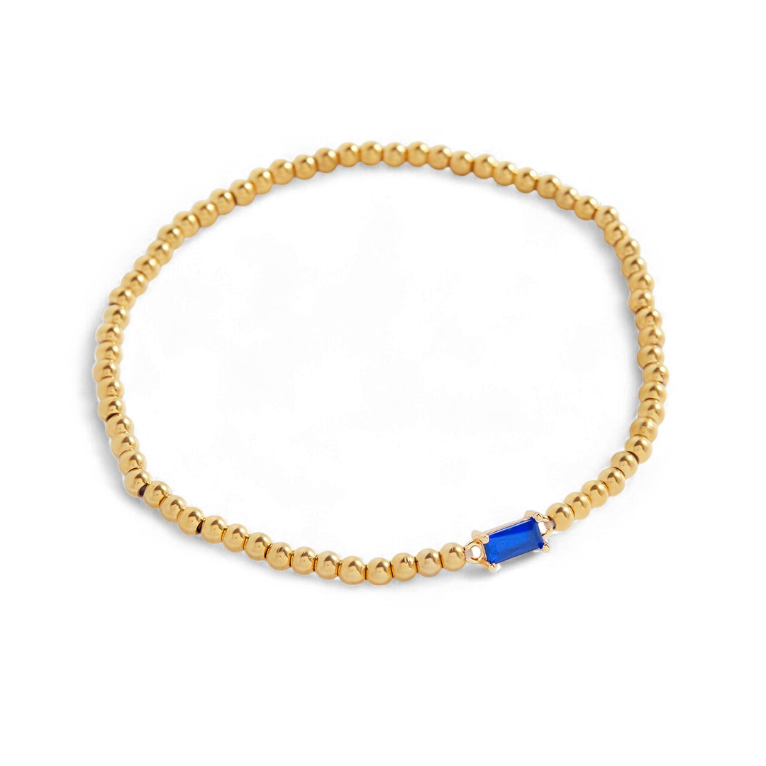 Pulsera de cuentas doradas con piedra natal