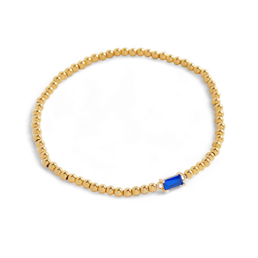 Pulsera de cuentas doradas con piedra natal