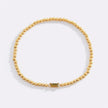 Pulsera de cuentas doradas con piedra natal