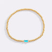 Pulsera de cuentas doradas con piedra natal