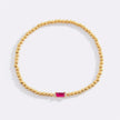 Pulsera de cuentas doradas con piedra natal