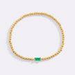 Pulsera de cuentas doradas con piedra natal