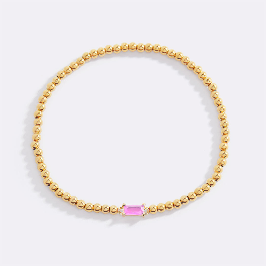 Pulsera de cuentas doradas con piedra natal