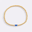 Pulsera de cuentas doradas con piedra natal