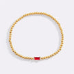 Pulsera de cuentas doradas con piedra natal