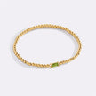 Pulsera de cuentas doradas con piedra natal