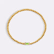 Pulsera de cuentas doradas con piedra natal