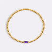 Pulsera de cuentas doradas con piedra natal