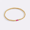 Pulsera de cuentas doradas con piedra natal