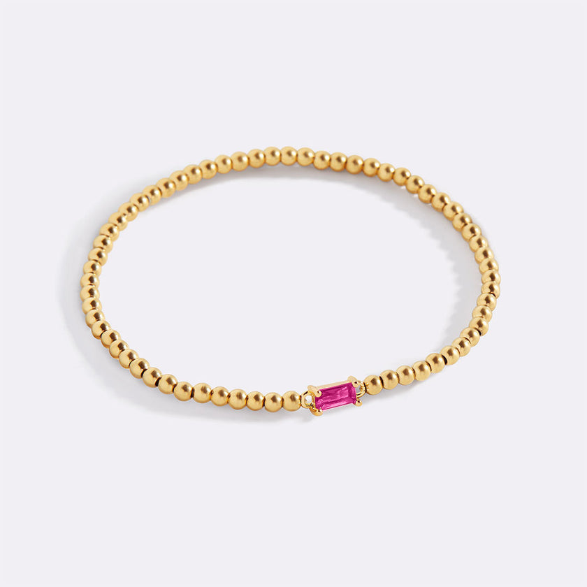 Pulsera de cuentas doradas con piedra natal