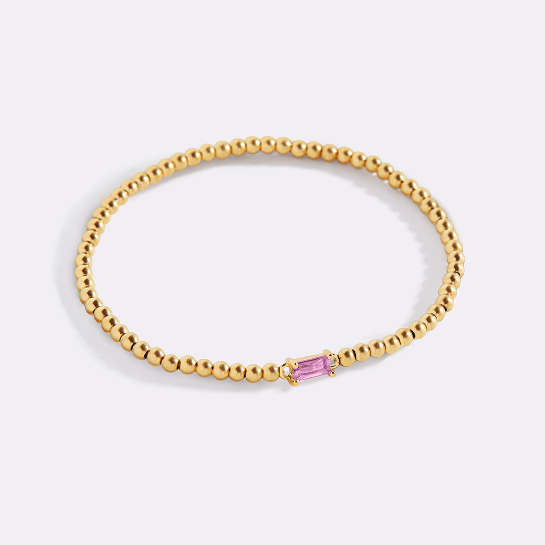 Pulsera de cuentas doradas con piedra natal