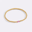 Pulsera de cuentas doradas con piedra natal
