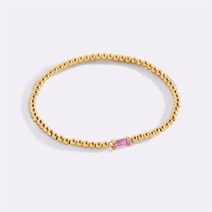 Pulsera de cuentas doradas con piedra natal