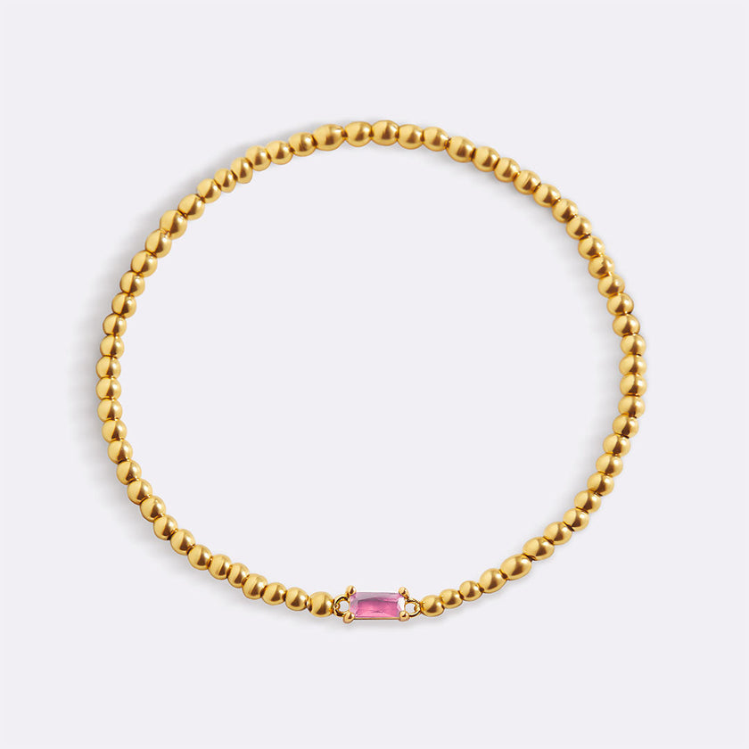 Pulsera de cuentas doradas con piedra natal