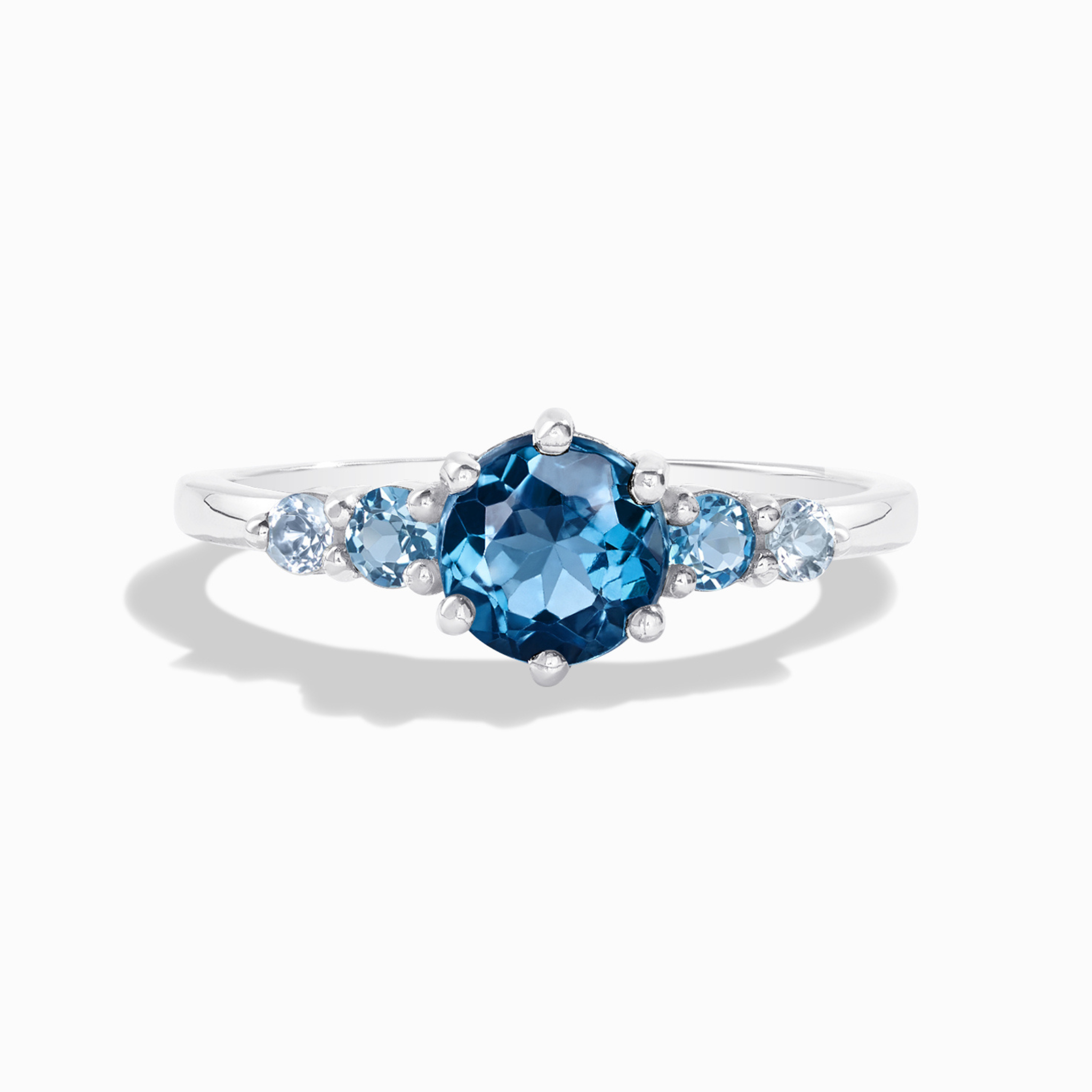 Anillo de cinco piedras de topacio azul degradado en plata de ley