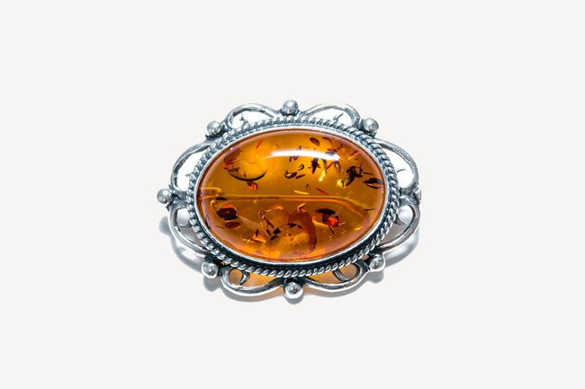 Oval Classic Framed Amber Brooch