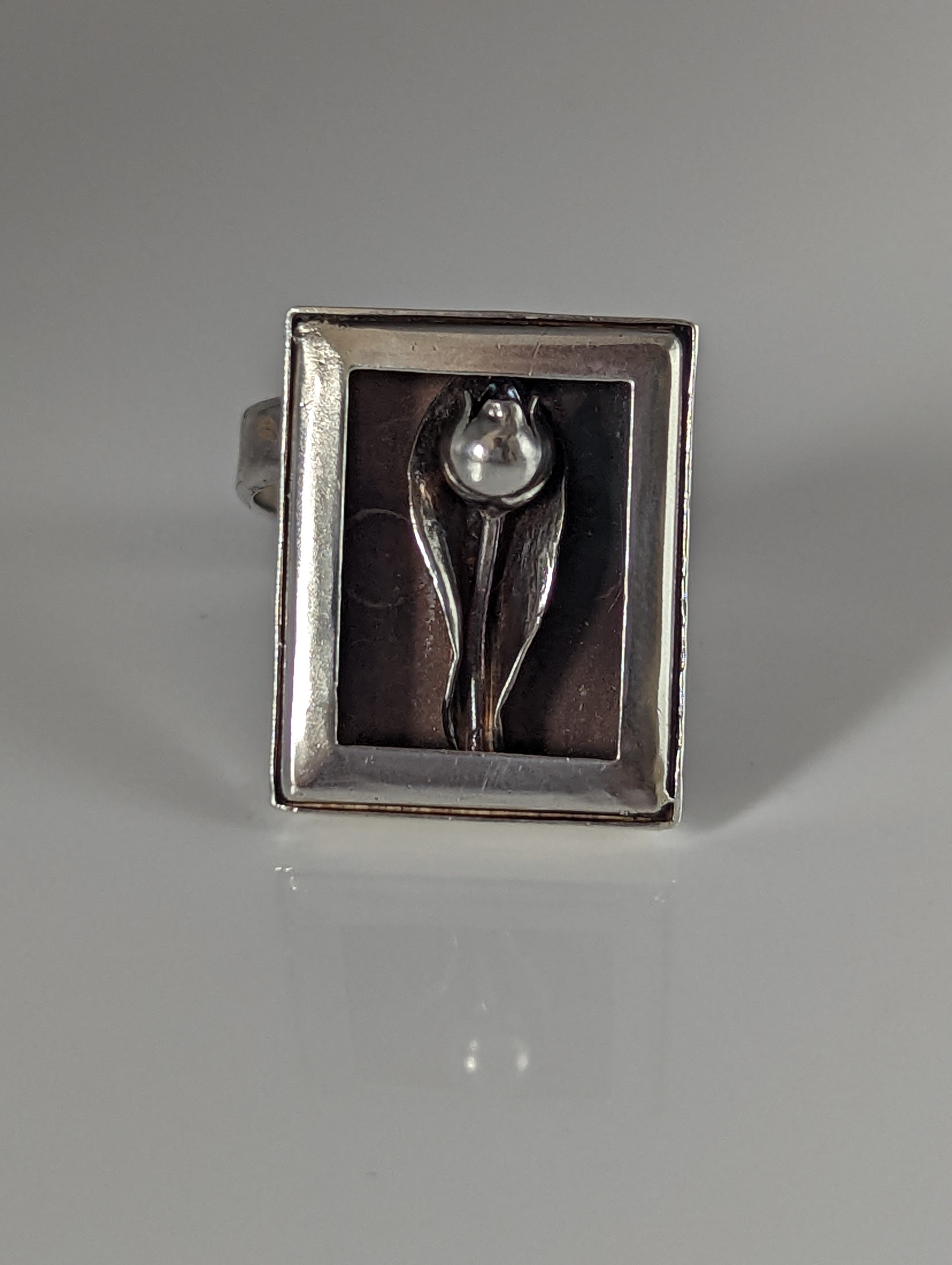 Silver Steed Large Unique Rose in a Frame Silver Ring