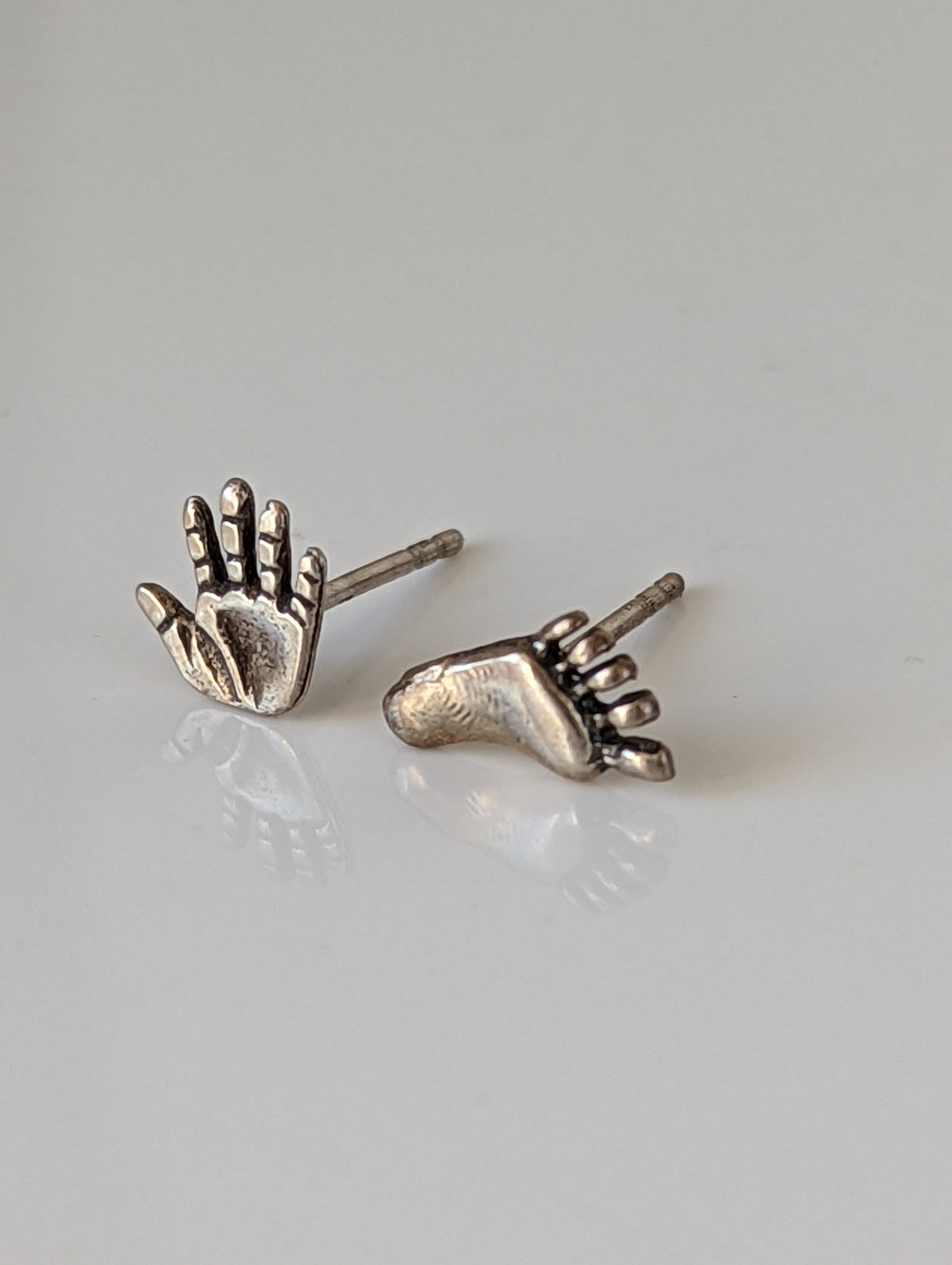 Silver Steed Hand and Foot Stud Earrings