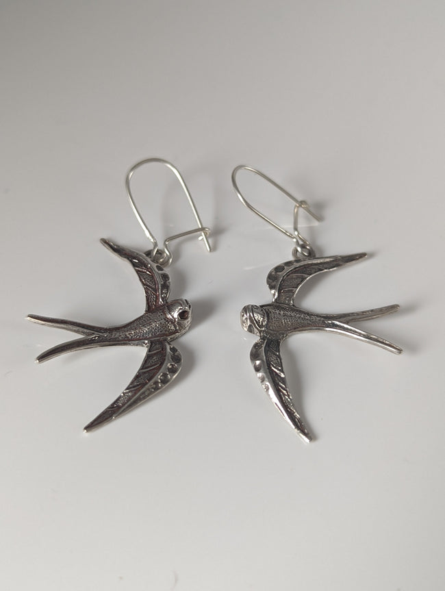 Pendientes colgantes plateados Golondrina Estallido de Plata