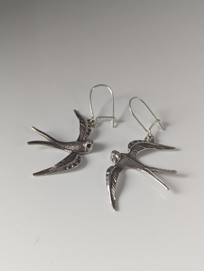 Pendientes colgantes plateados Golondrina Estallido de Plata