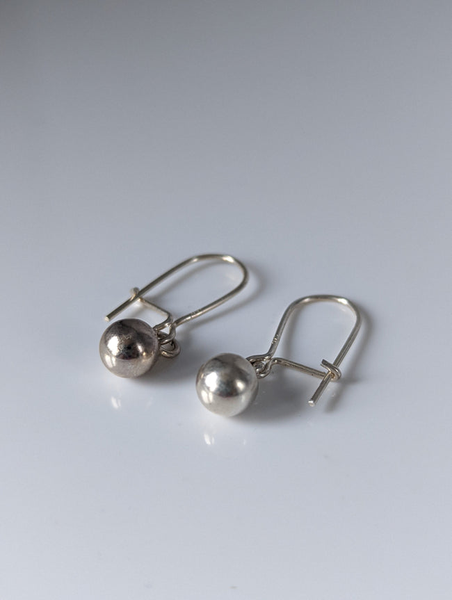 Pendientes Grandes Bolas Caídas Steed Plateado