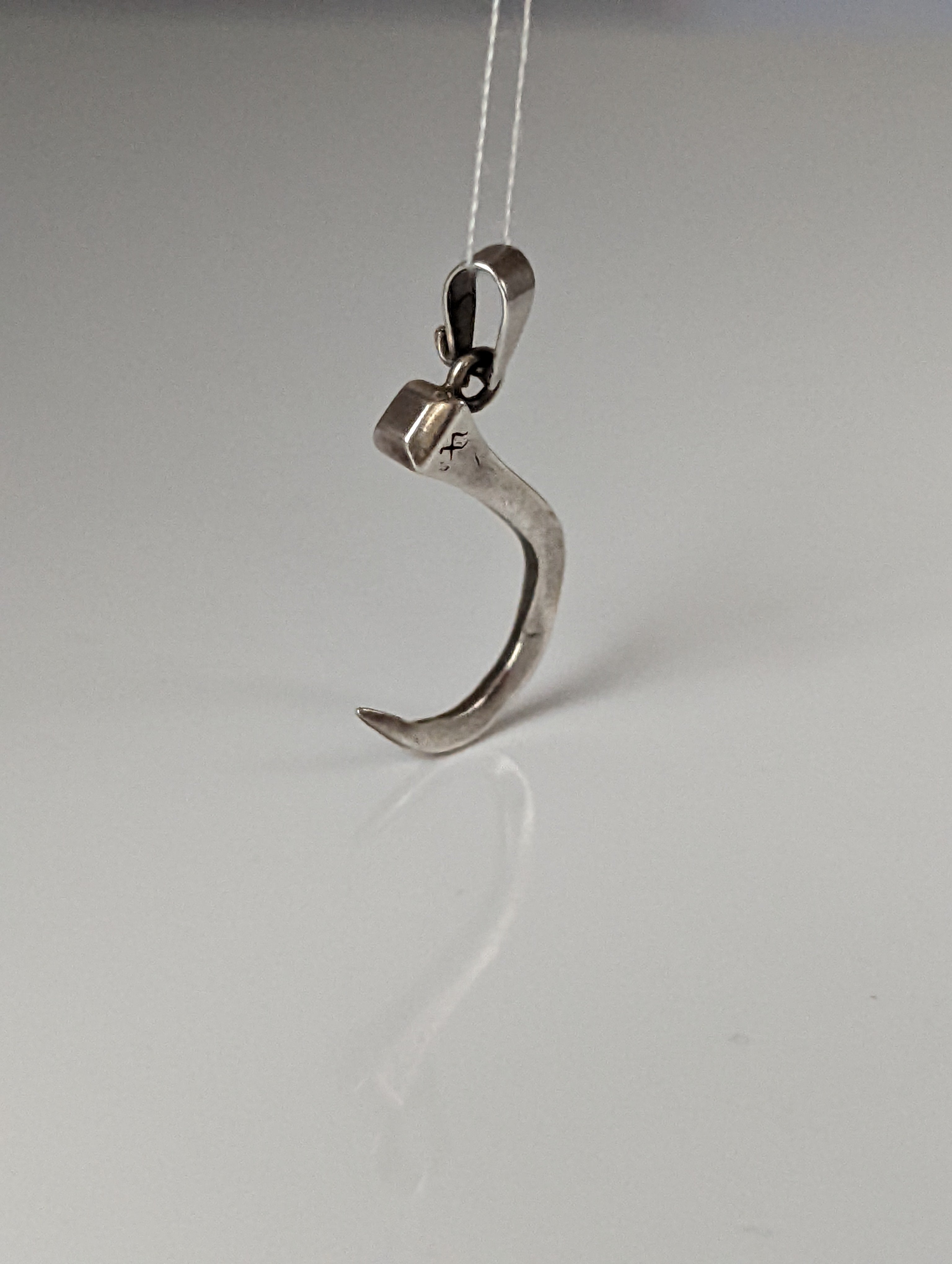 Silver Steed Curved Horseshoe Nail Silver Pendant