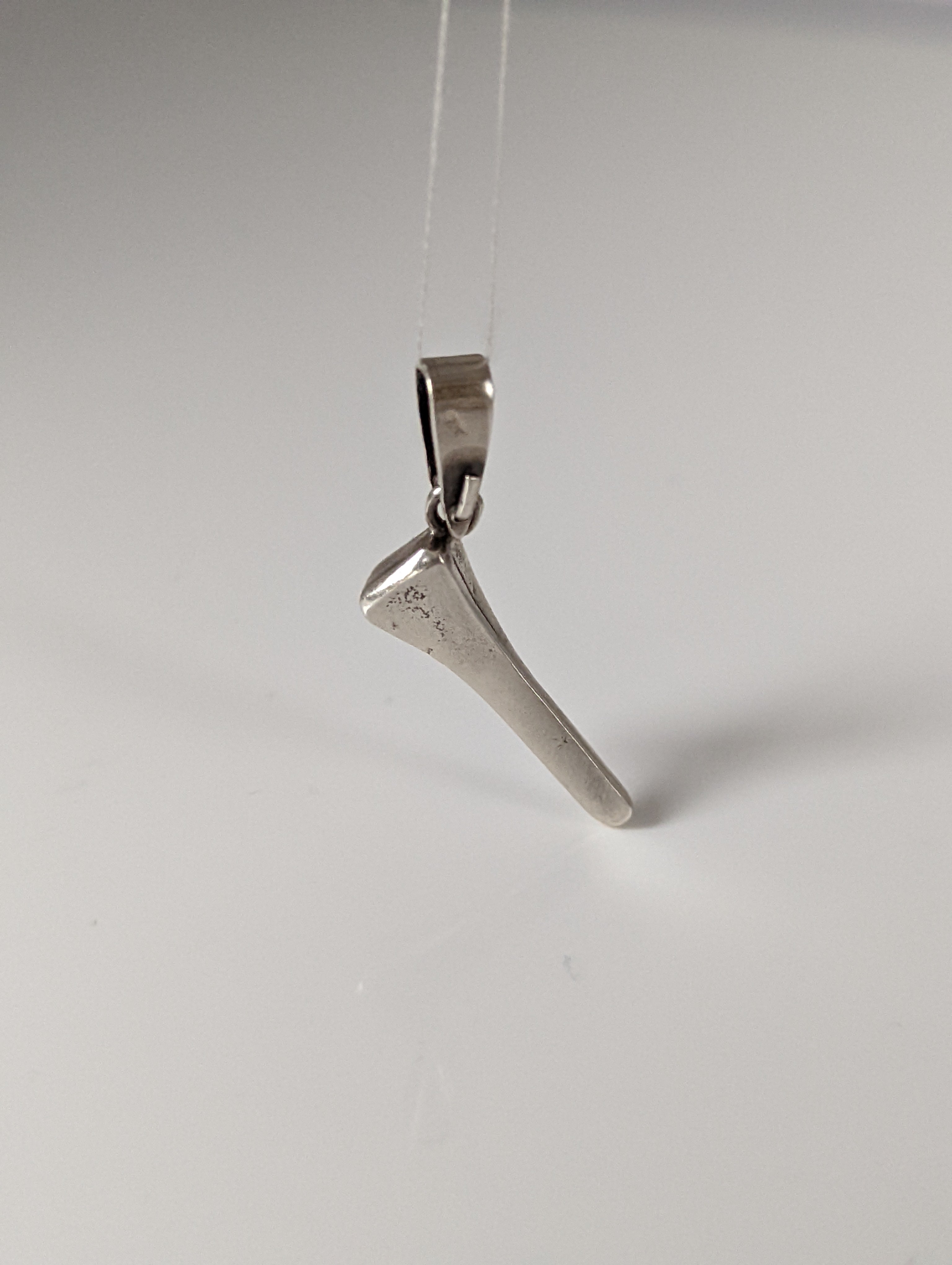 Silver Steed Horseshoe Nail Silver Pendant