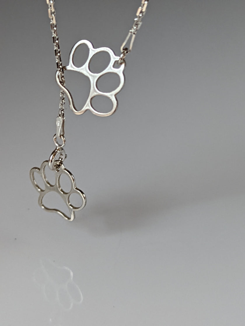 Silver Steed Thread Through Double Paw Print Silver Necklace