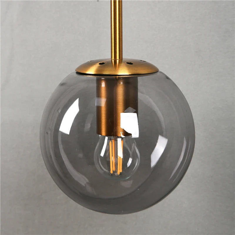 Sizzle Wandlampe mit Glaskugel im Mid-Century-Stil – Bernstein/Rauch/Klar