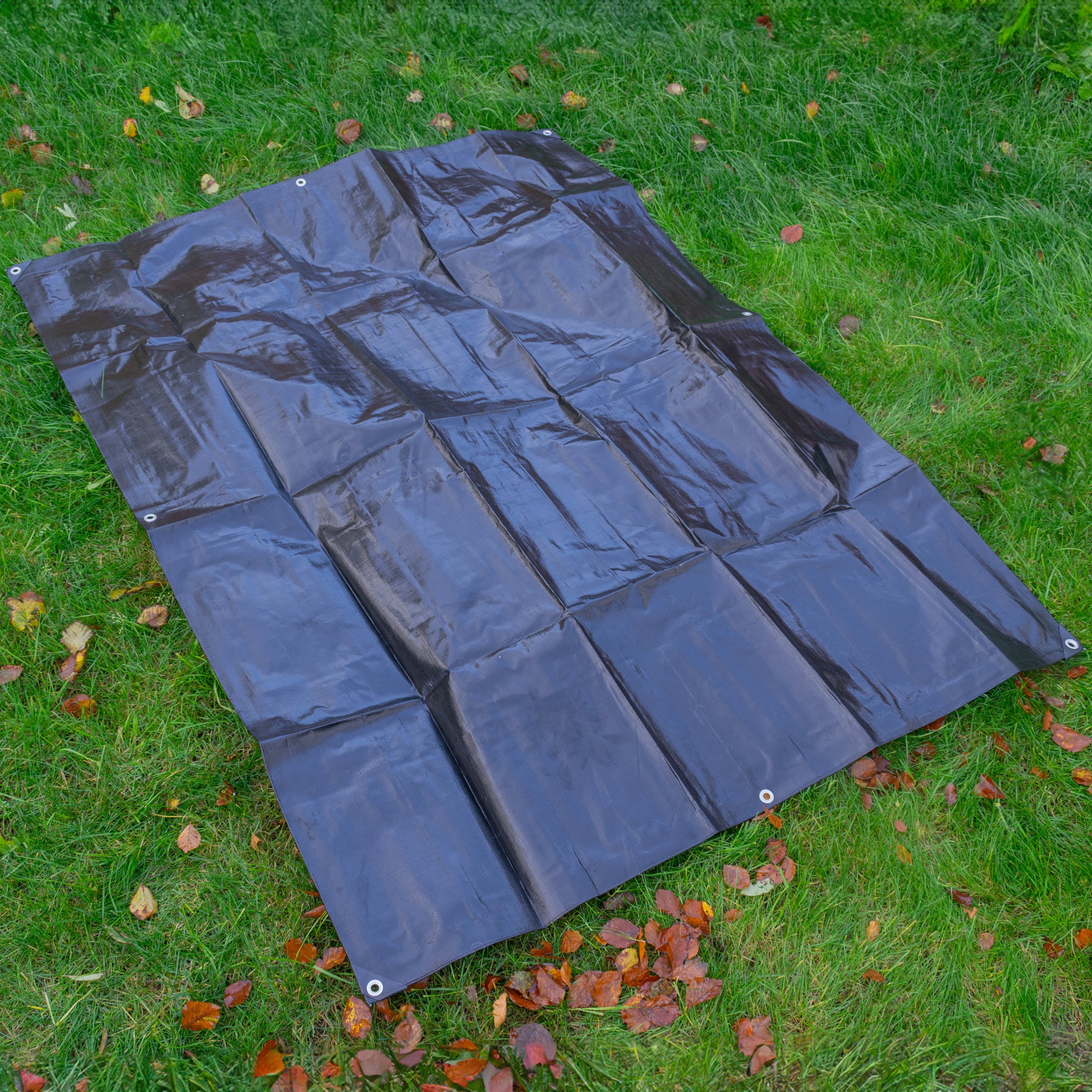 Black/Silver L-Grade Tarpaulin with 10 Metres of 8mm Bungee Rope