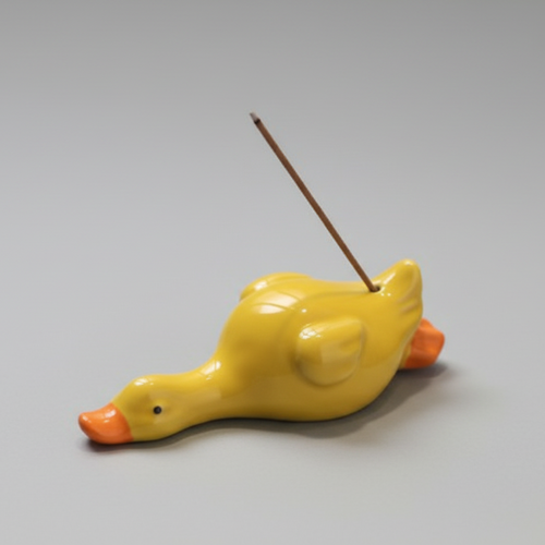 A Ceramic Lazy Duck Incense Holder