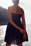 The Harlow Smocked Mini Dress in black