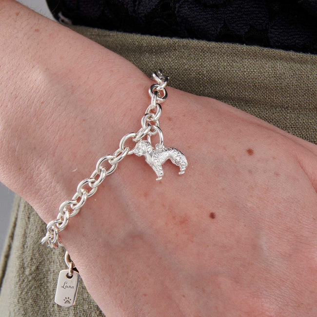Pulsera de plata con dije de perro cockapoo