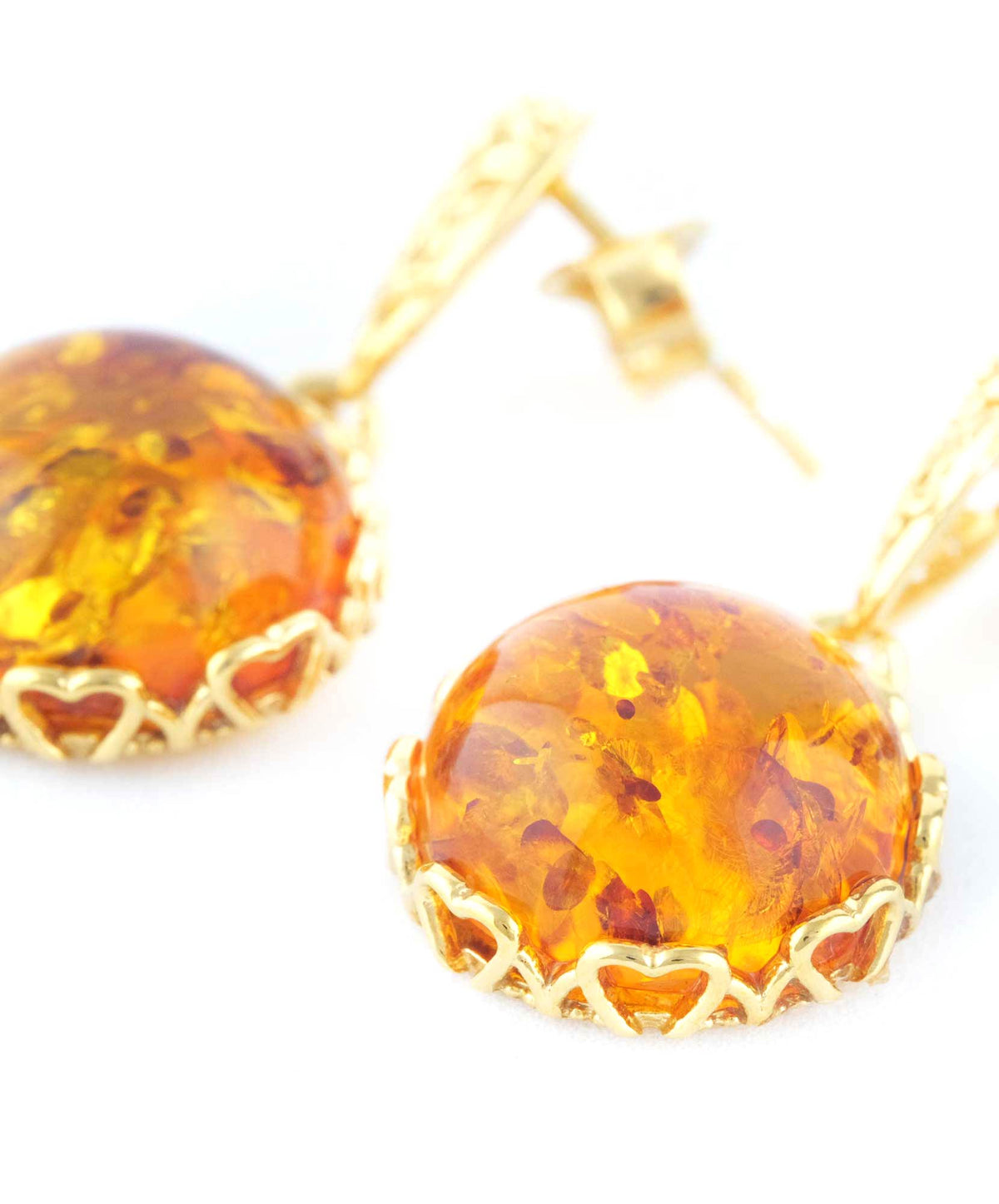Pendientes colgantes de ámbar con detalle floral dorado
