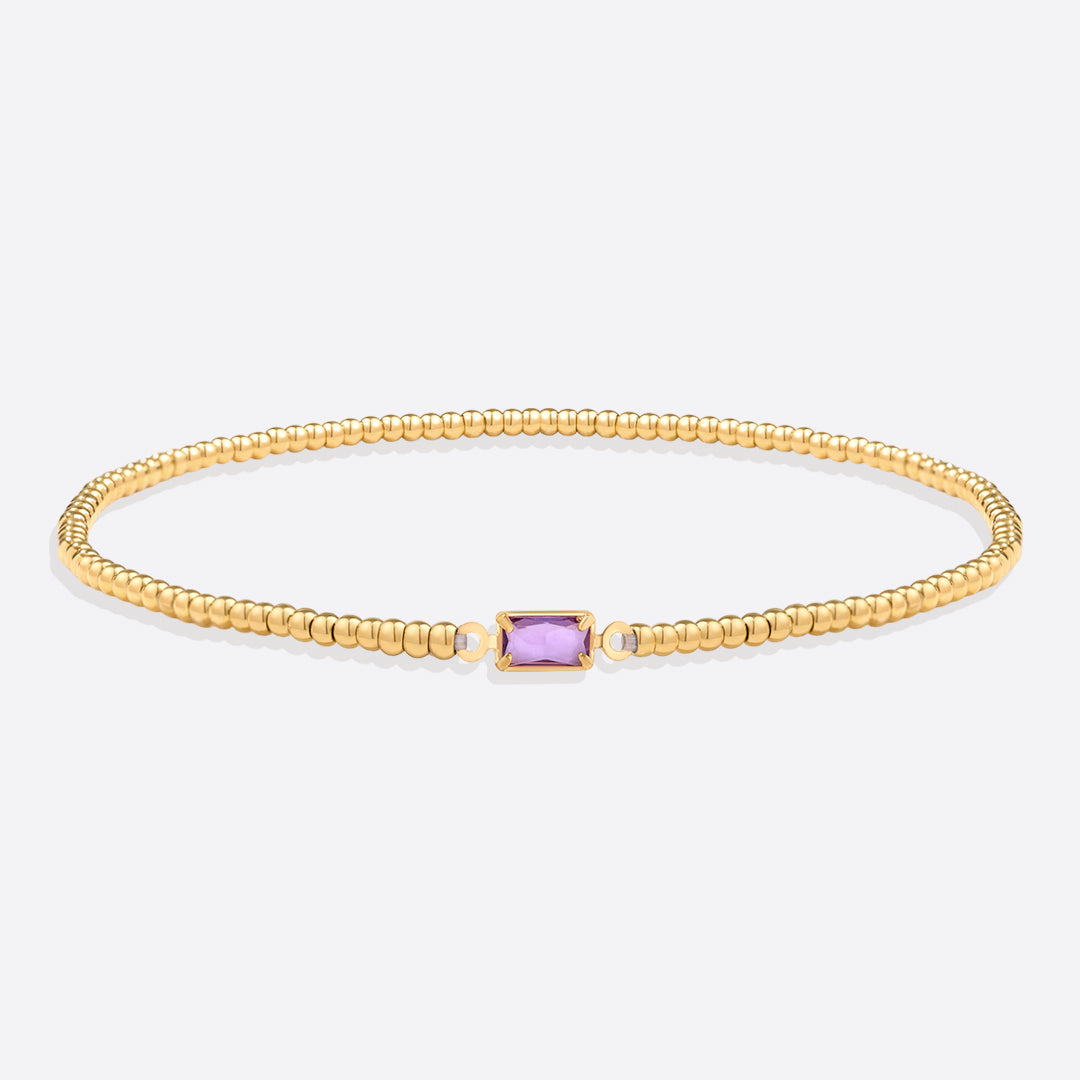 Pulsera de cuentas doradas con piedra natal