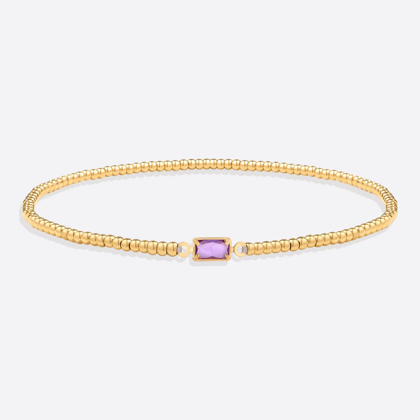 Pulsera de cuentas doradas con piedra natal