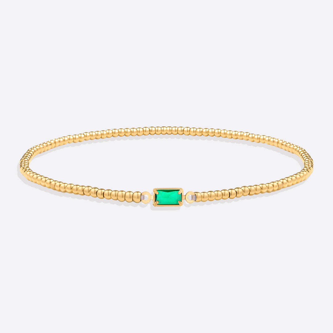 Pulsera de cuentas doradas con piedra natal