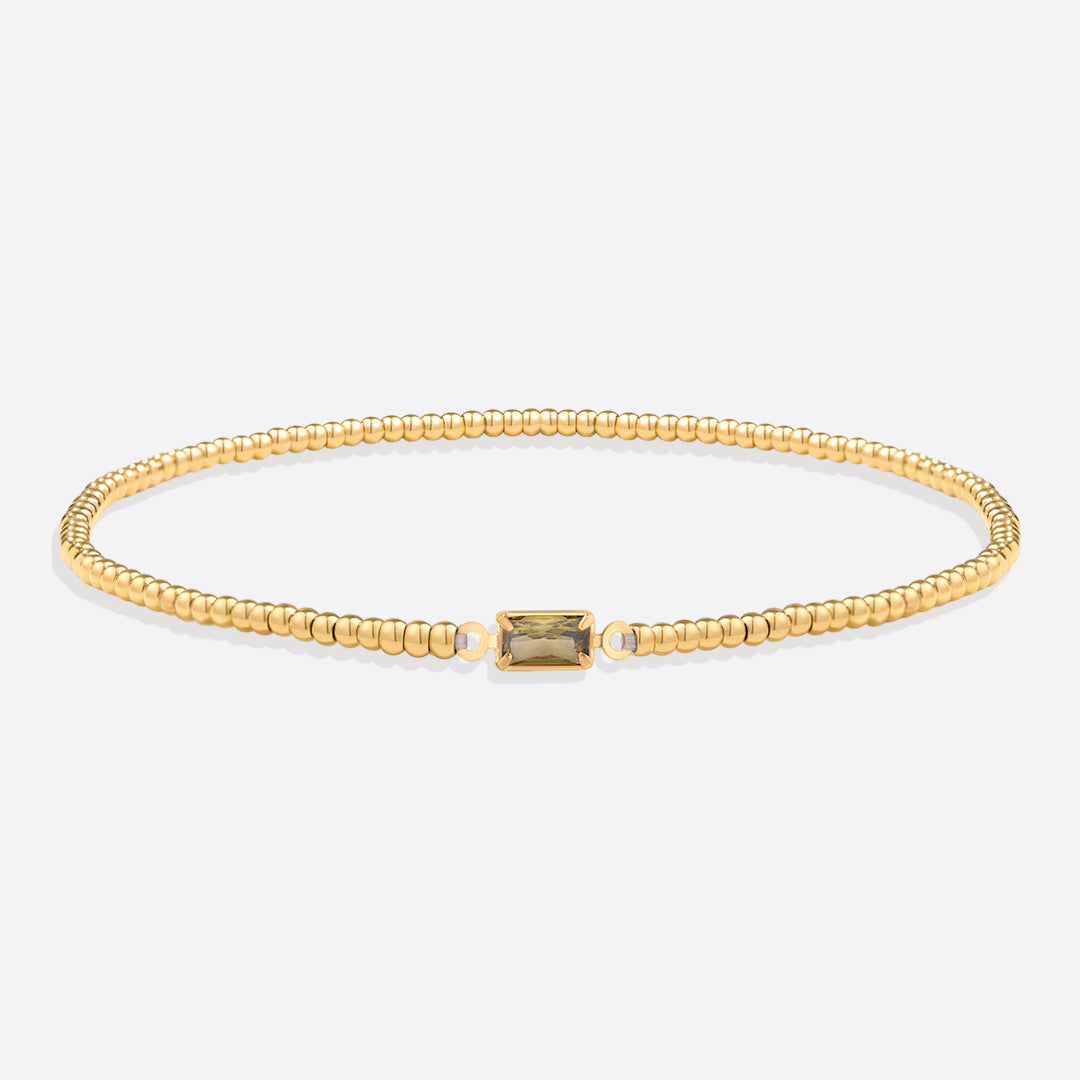 Pulsera de cuentas doradas con piedra natal