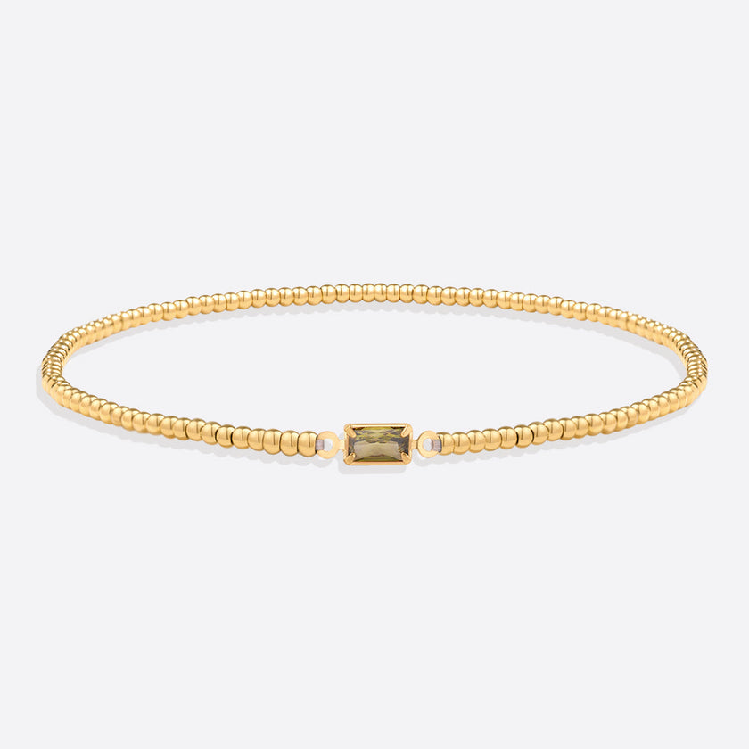 Pulsera de cuentas doradas con piedra natal