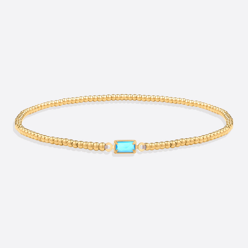 Pulsera de cuentas doradas con piedra natal