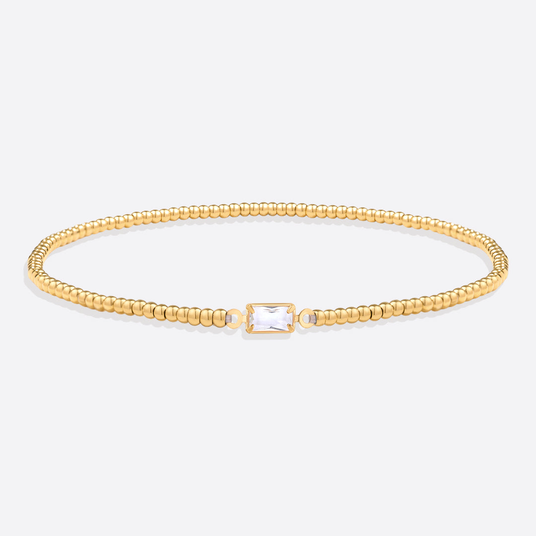 Pulsera de cuentas doradas con piedra natal