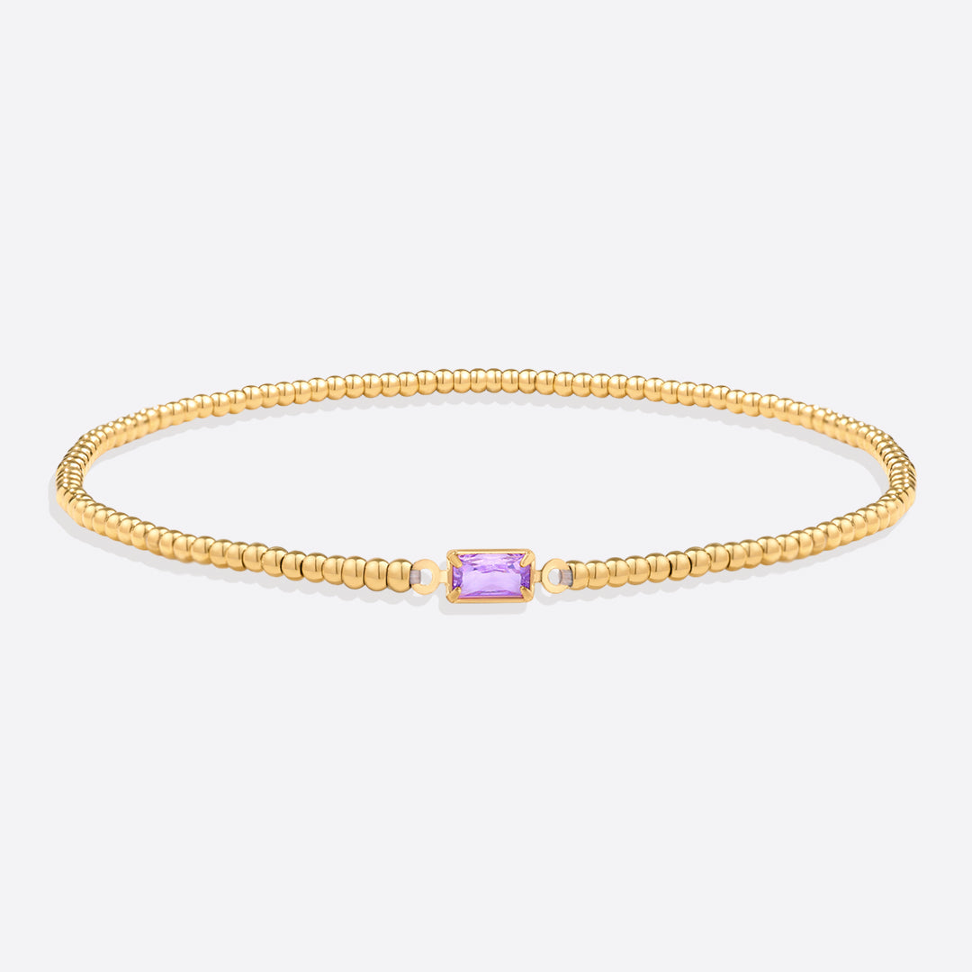 Pulsera de cuentas doradas con piedra natal