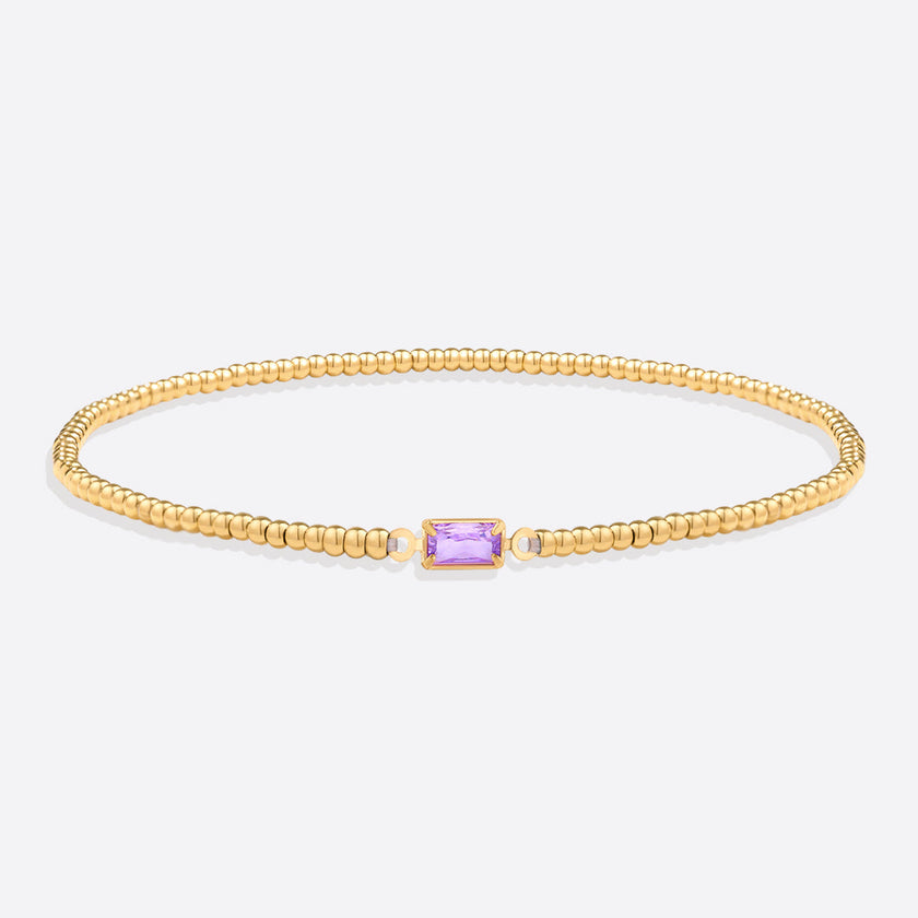 Pulsera de cuentas doradas con piedra natal