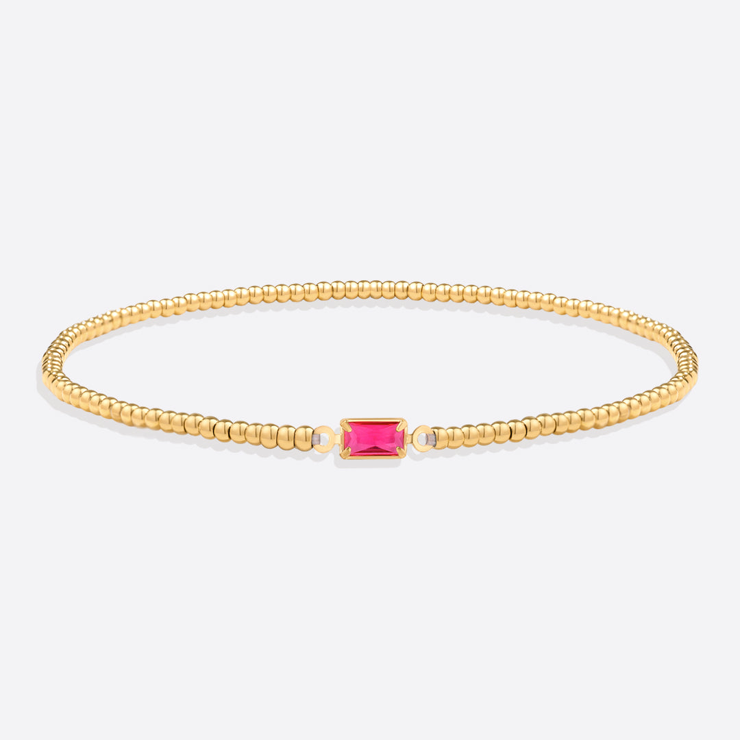 Pulsera de cuentas doradas con piedra natal