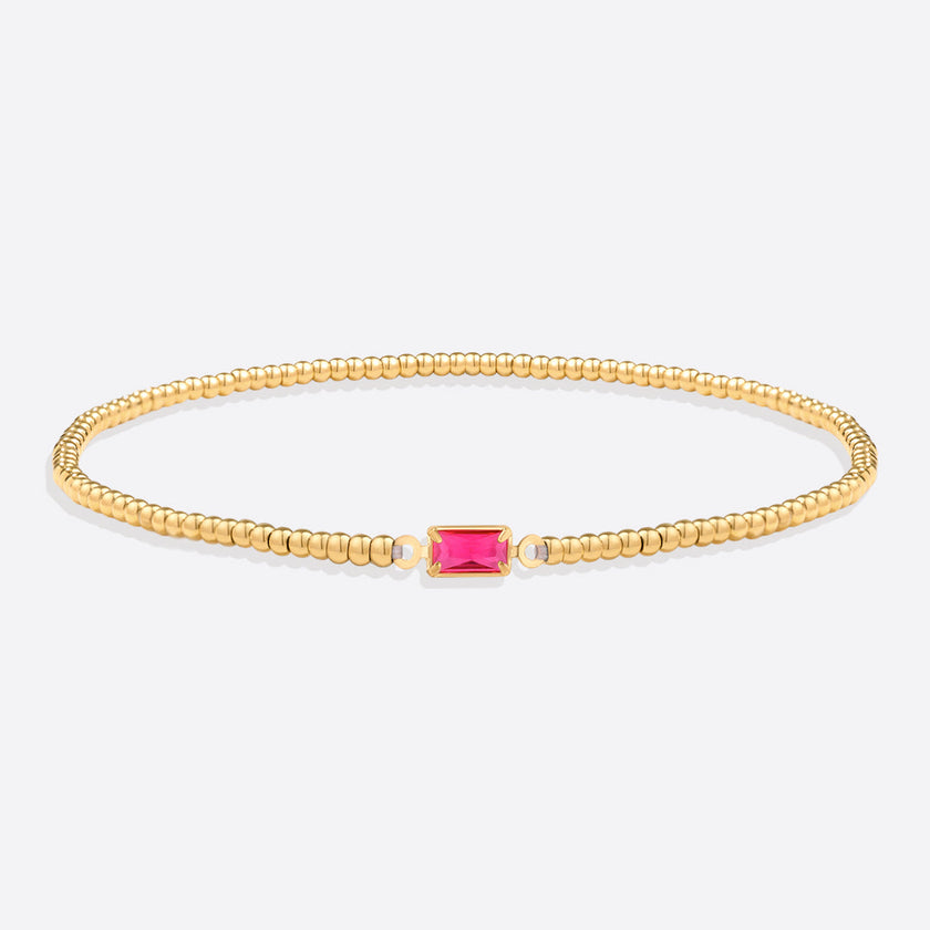 Pulsera de cuentas doradas con piedra natal