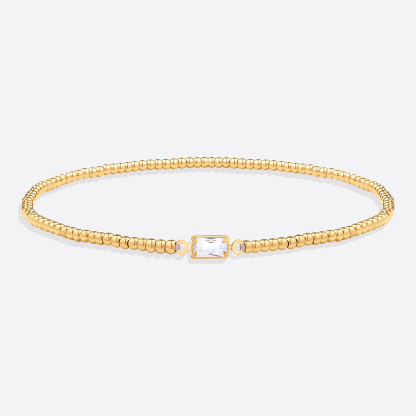 Pulsera de cuentas doradas con piedra natal
