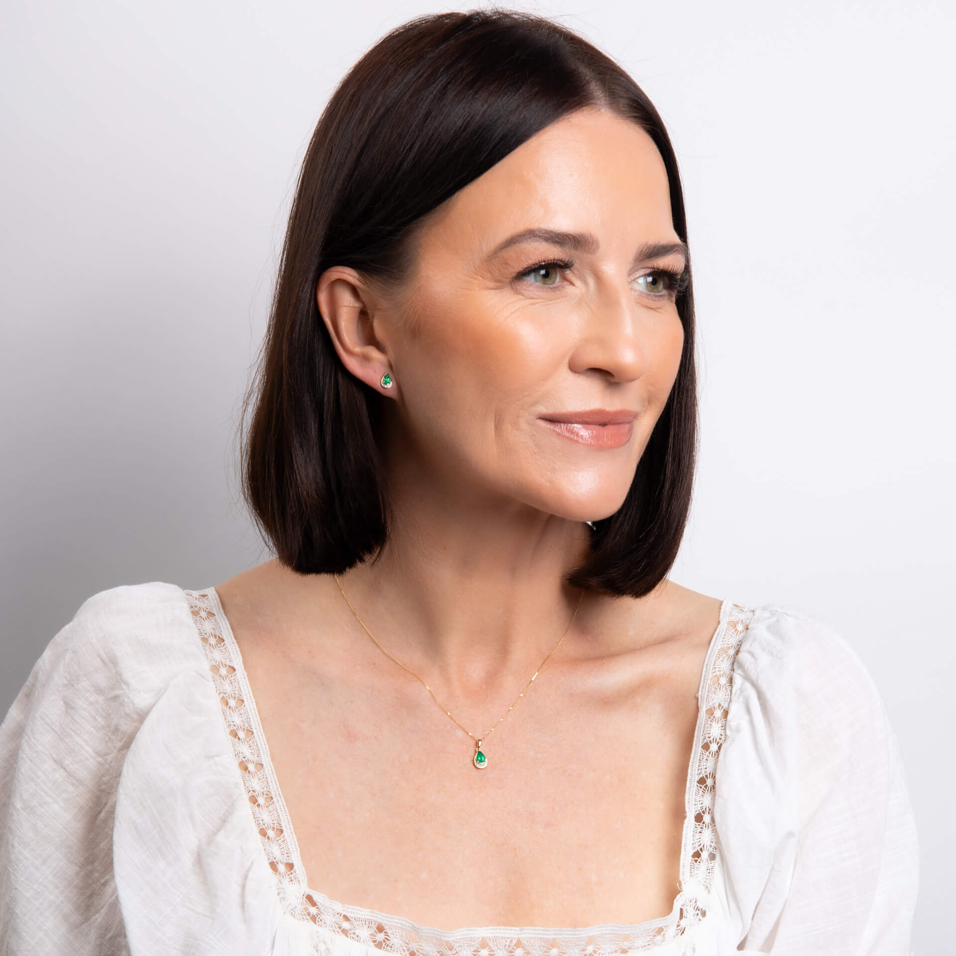 Elements Gold Teardrop Emerald and Diamond Stud Earrings