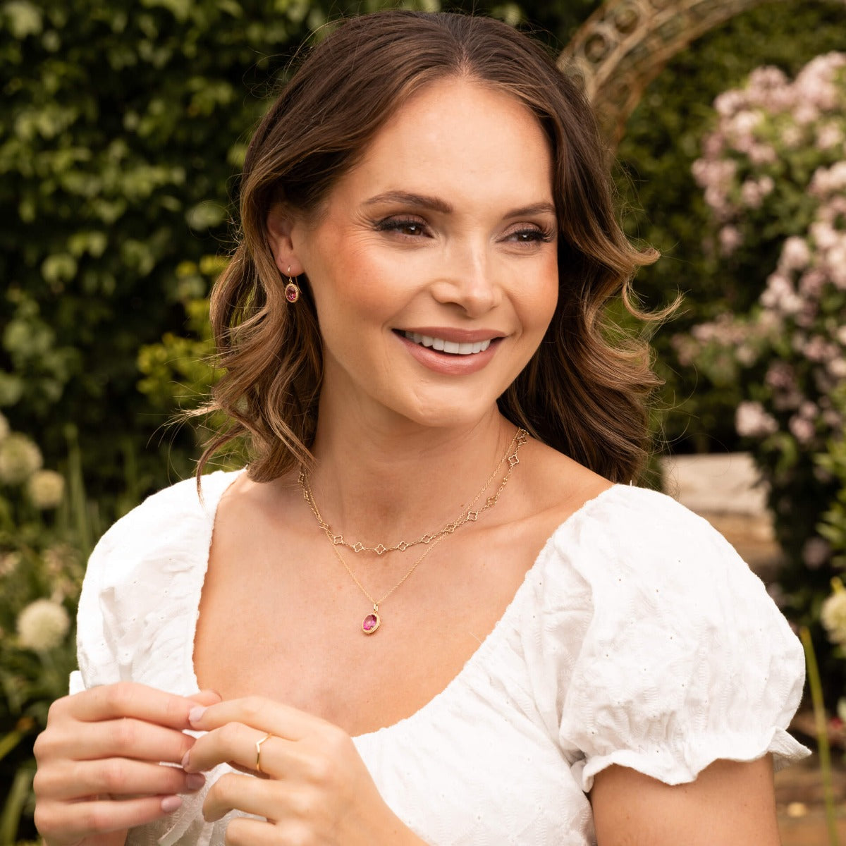 Elements Gold Oval Cut Pink Topaz Drop Earrings