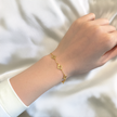 Pulsera de trébol calado en oro