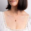 Elements Gold Oval Cut Pink Topaz Pendant